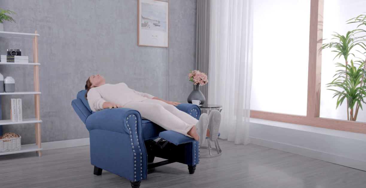 Pushbackrecliner A woman is relaxing on massage chair